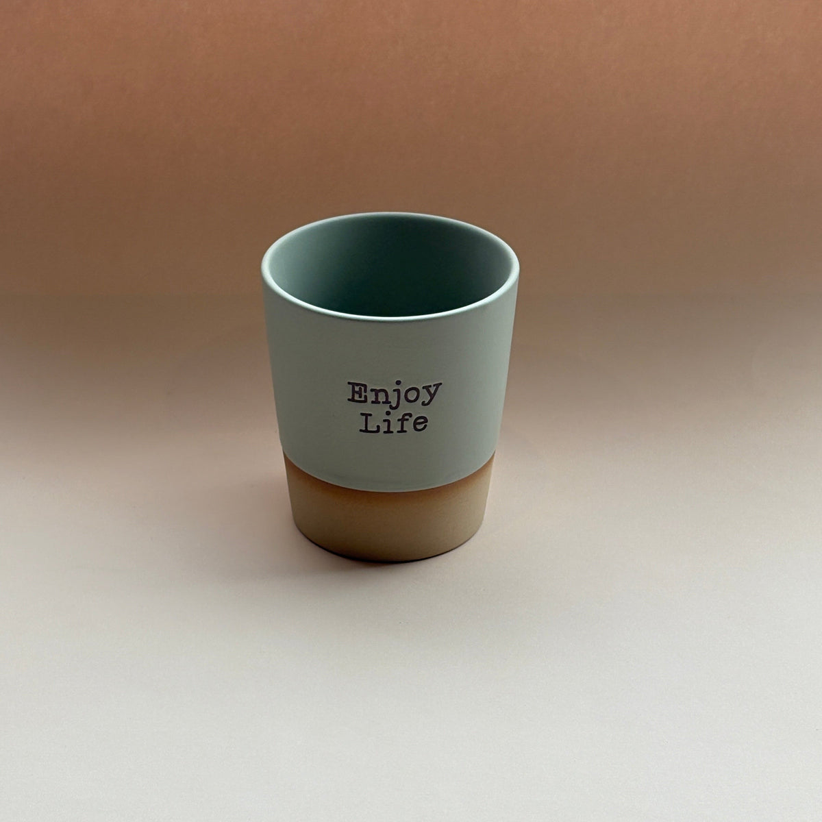 Ceramic Mug with Enjoy Life' text on a gradient background