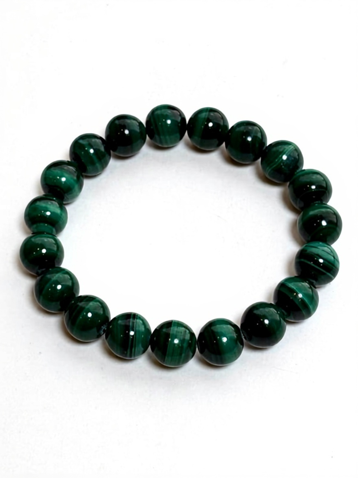 Malachite bracelet with polished green beads for transformation and emotional healing