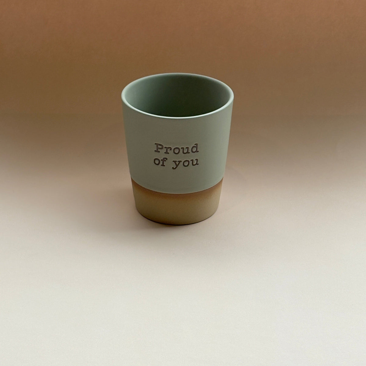Hand glazed Proud of You ceramic mug with natural finish and unique glaze effect