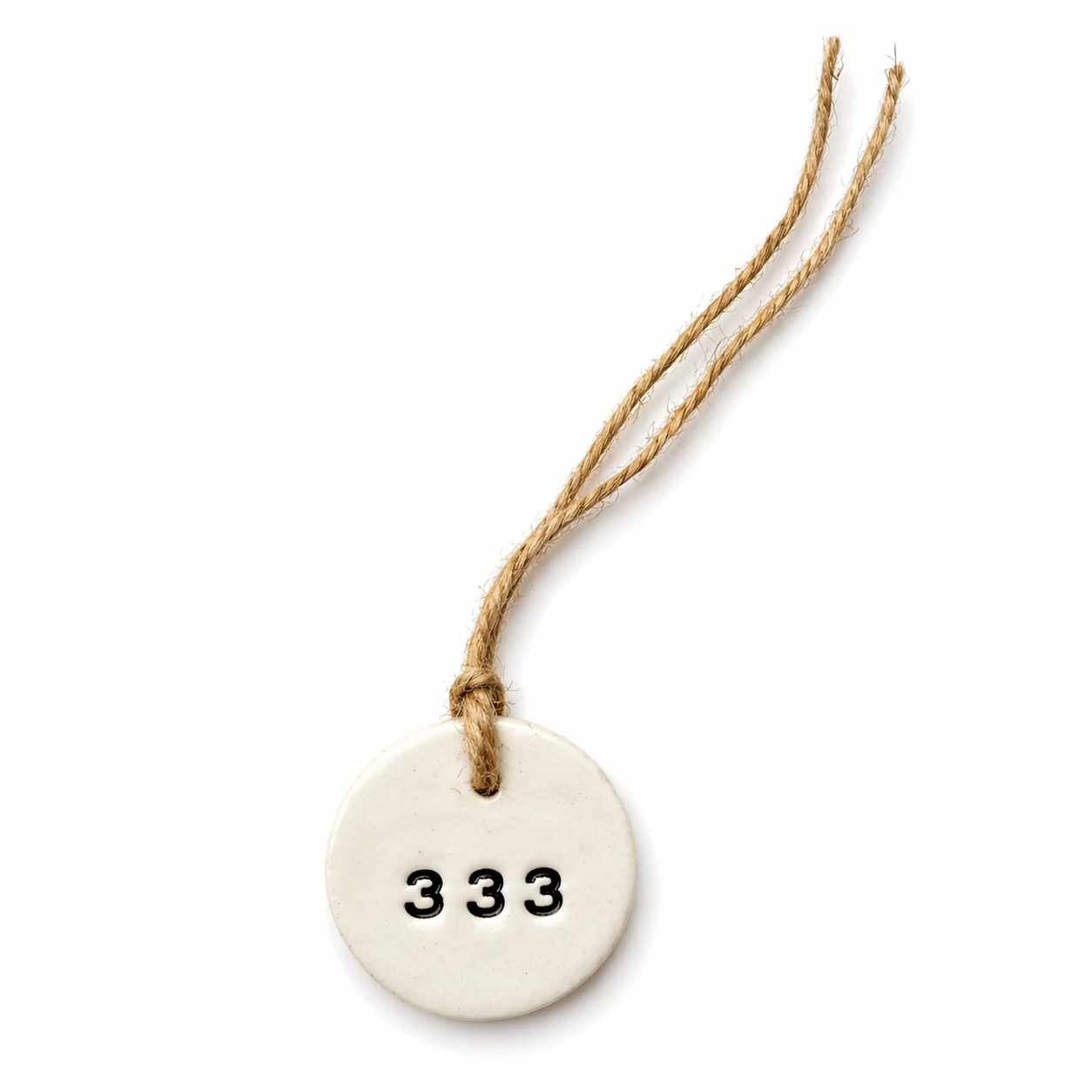 Handmade white round ceramic hanging tag with 333 angel number and natural jute twine