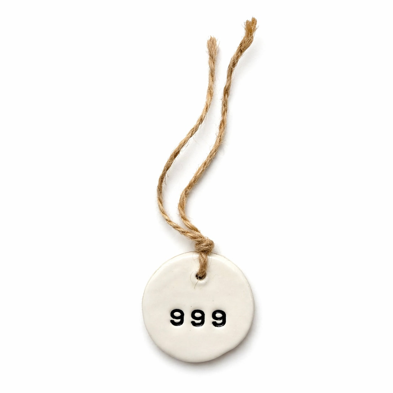 Handmade white round ceramic hanging tag with 999 angel number and natural jute twine