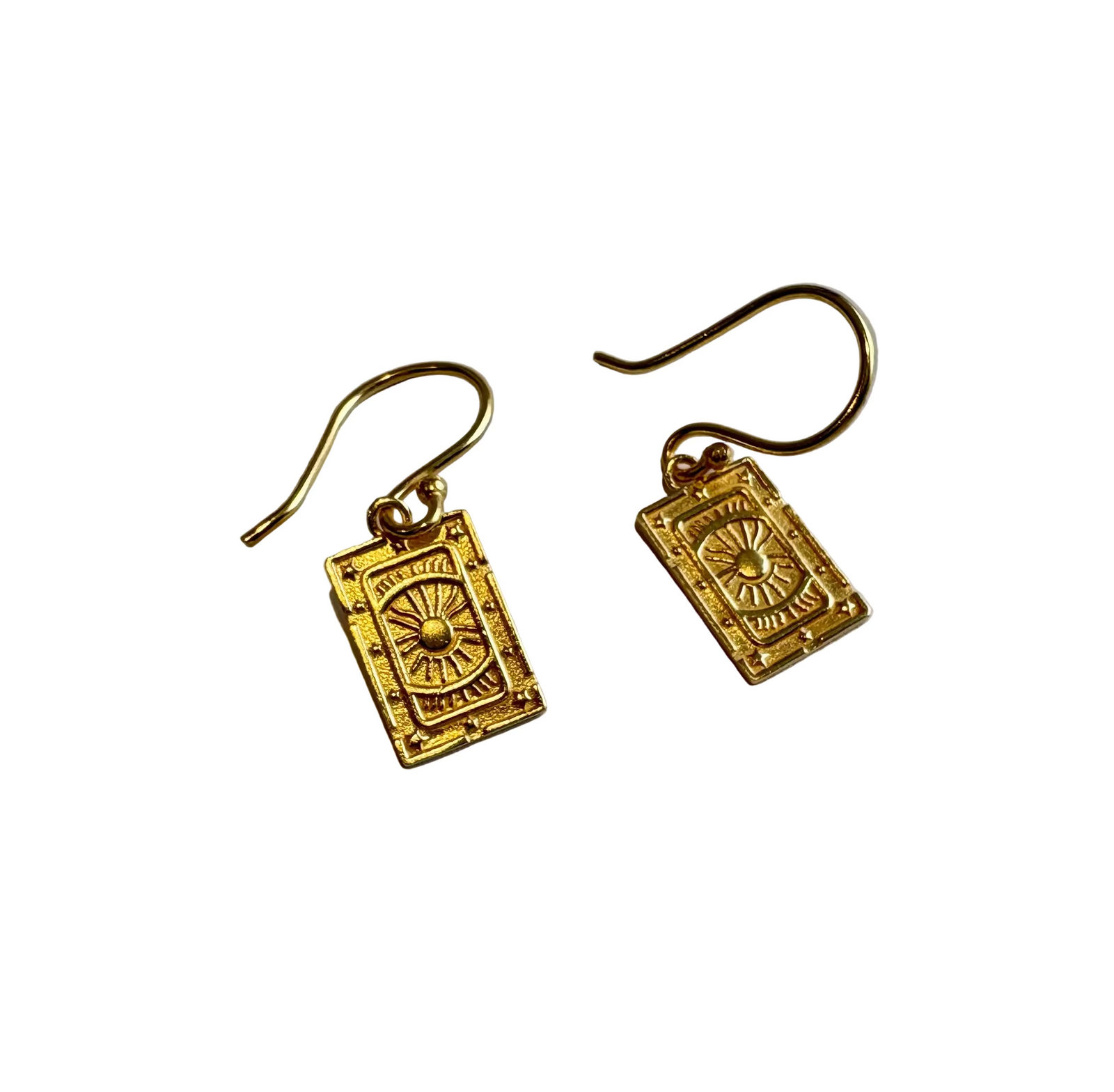 Gold tarot card drop earrings with embossed symbolic design and hook backing