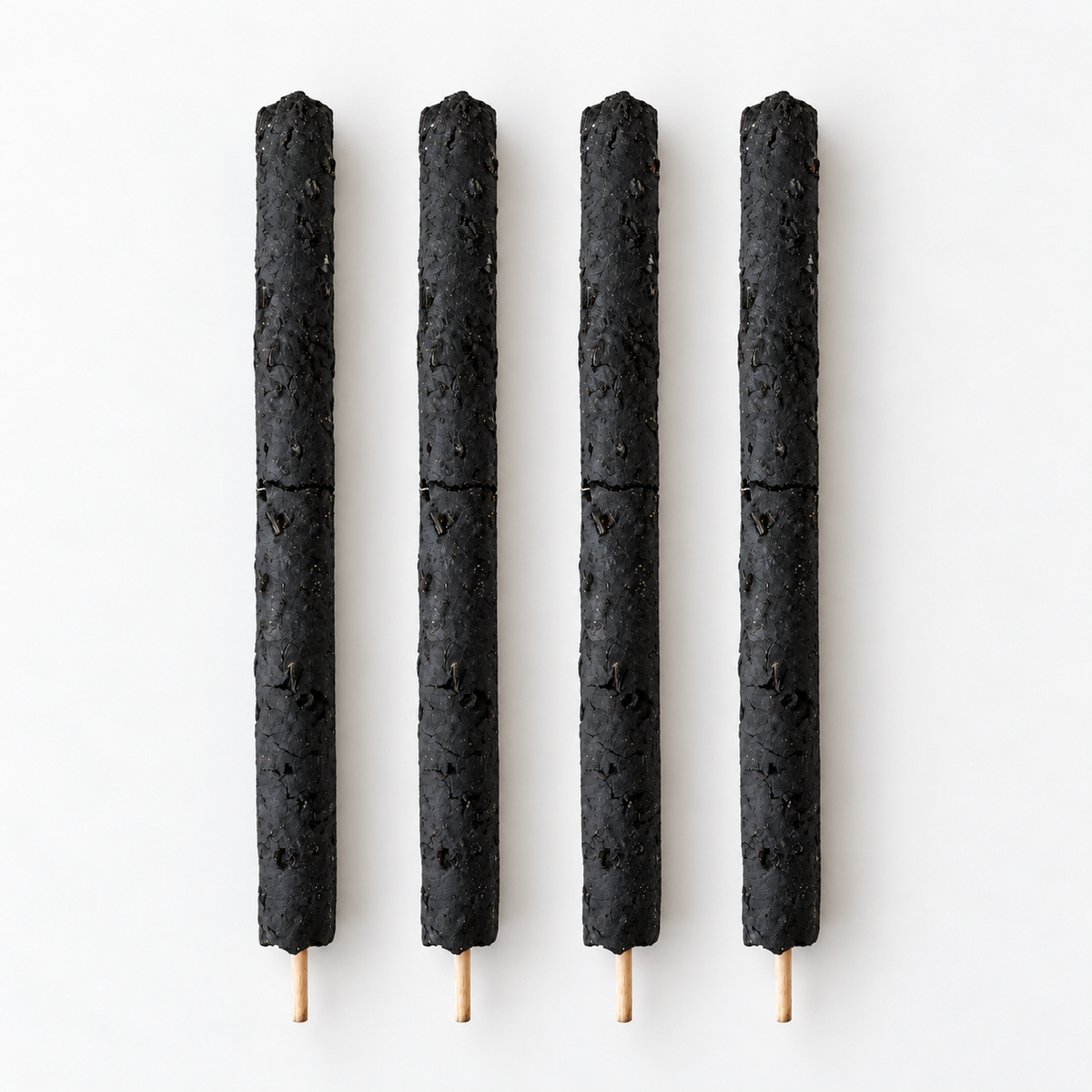 Four unburnt Incan breuzinho Incense Santo wood sticks arranged side by side on a clean white background.