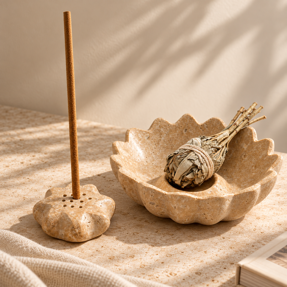 Natural travertine Lotus Stone Incense Holder with sculptural ash-catching tray and rounded stick holder.
