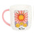 Two mugs with sun and moon designs on a white background