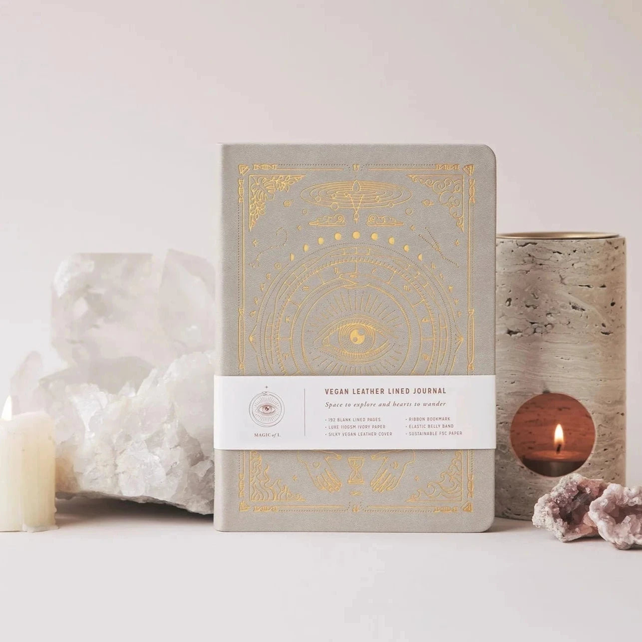 Lifestyle photo of A5 Stone Origins Journal with crystals and candle