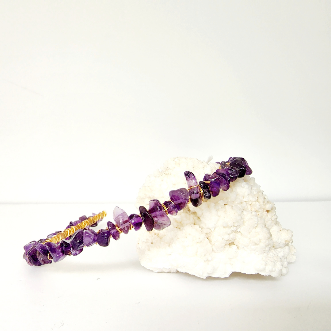 Amethyst crystal chip headband with gold tone wire wrapping, purple gemstone accessory for calm and balance.