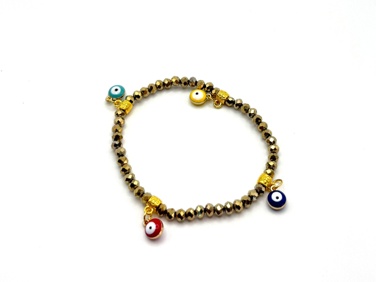 Beaded crystal Mati evil eye bracelet in Gold with gold plated accents.