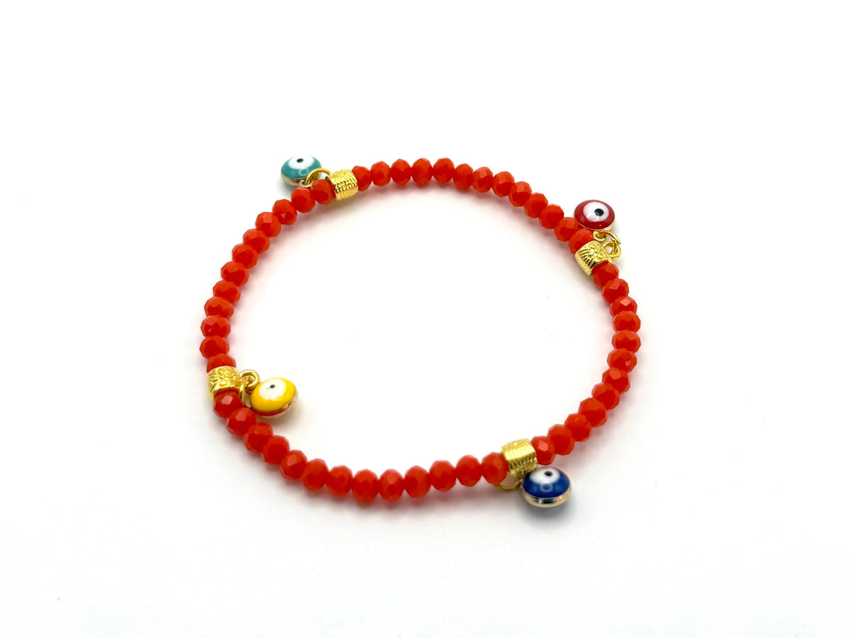 Beaded crystal Mati evil eye bracelet in Orange with gold plated accents.