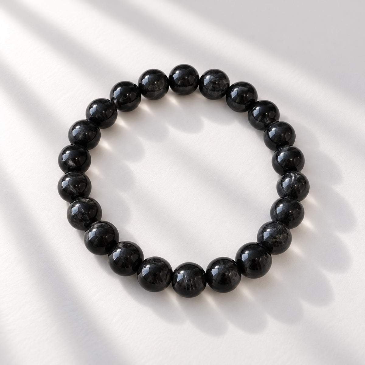 Black Tourmaline bracelet featuring 8 mm round black beads.