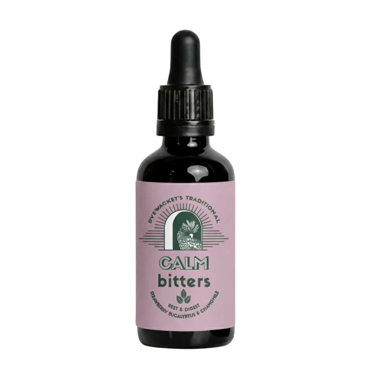 Bottle of Calm Bitters herbal tincture with dropper top and purple label on a white background