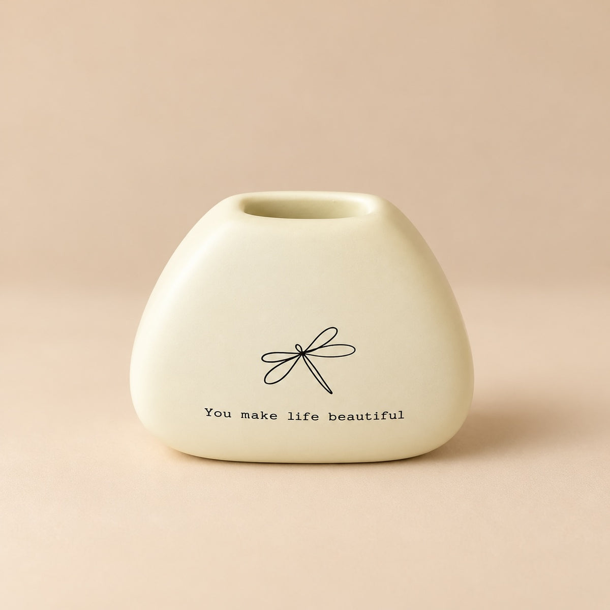 Small rounded light green mini resin vase with a black dragonfly illustration and “You make life beautiful” lettering.