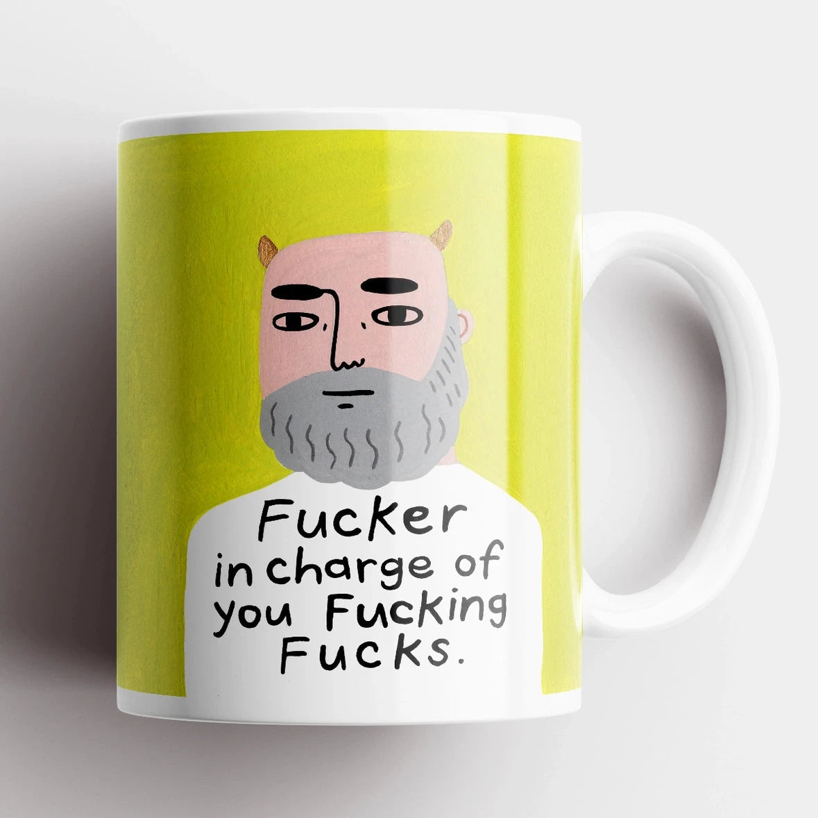 Fucker in Charge Grumpy Bastard Mug – funny ceramic mug with illustrated bearded man on yellow background.