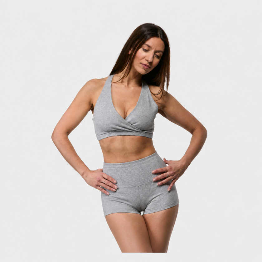 Front view of grey high waisted  cotton hot pants yoga shorts worn for yoga and Pilates