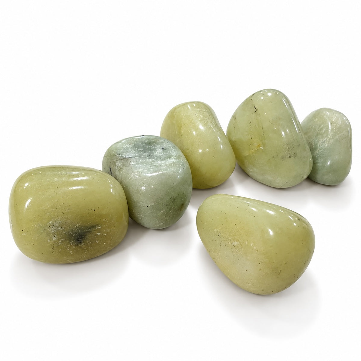 Polished pale green and grey green Jade tumble stones.