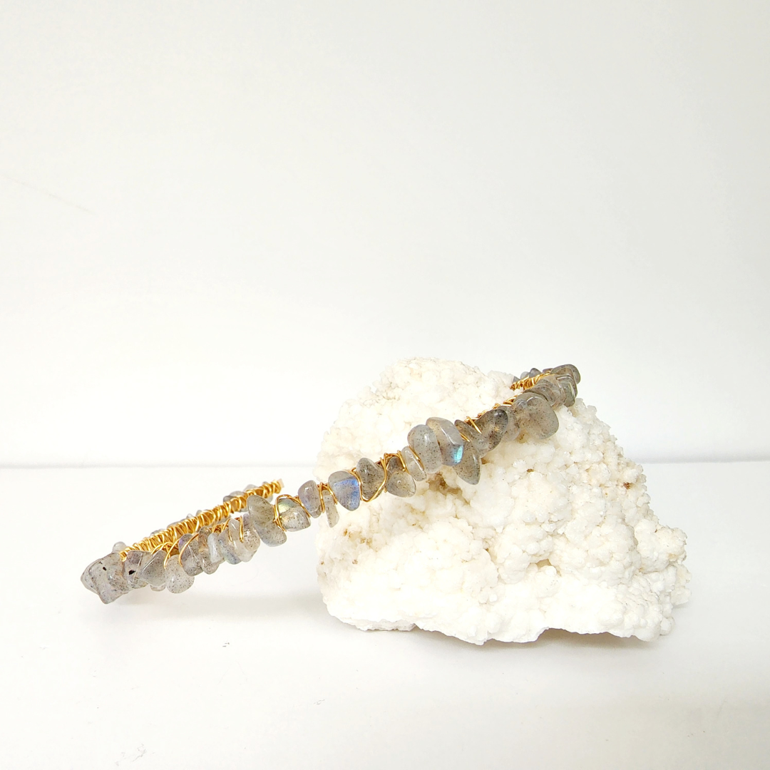 Labradorite crystal headband with natural gemstone shimmer, a protective and intuitive crystal accessory.
