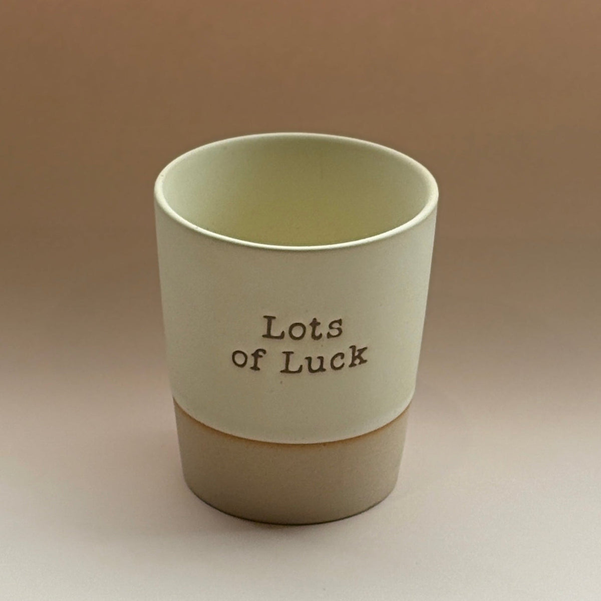 Mug with embossed lots of luck