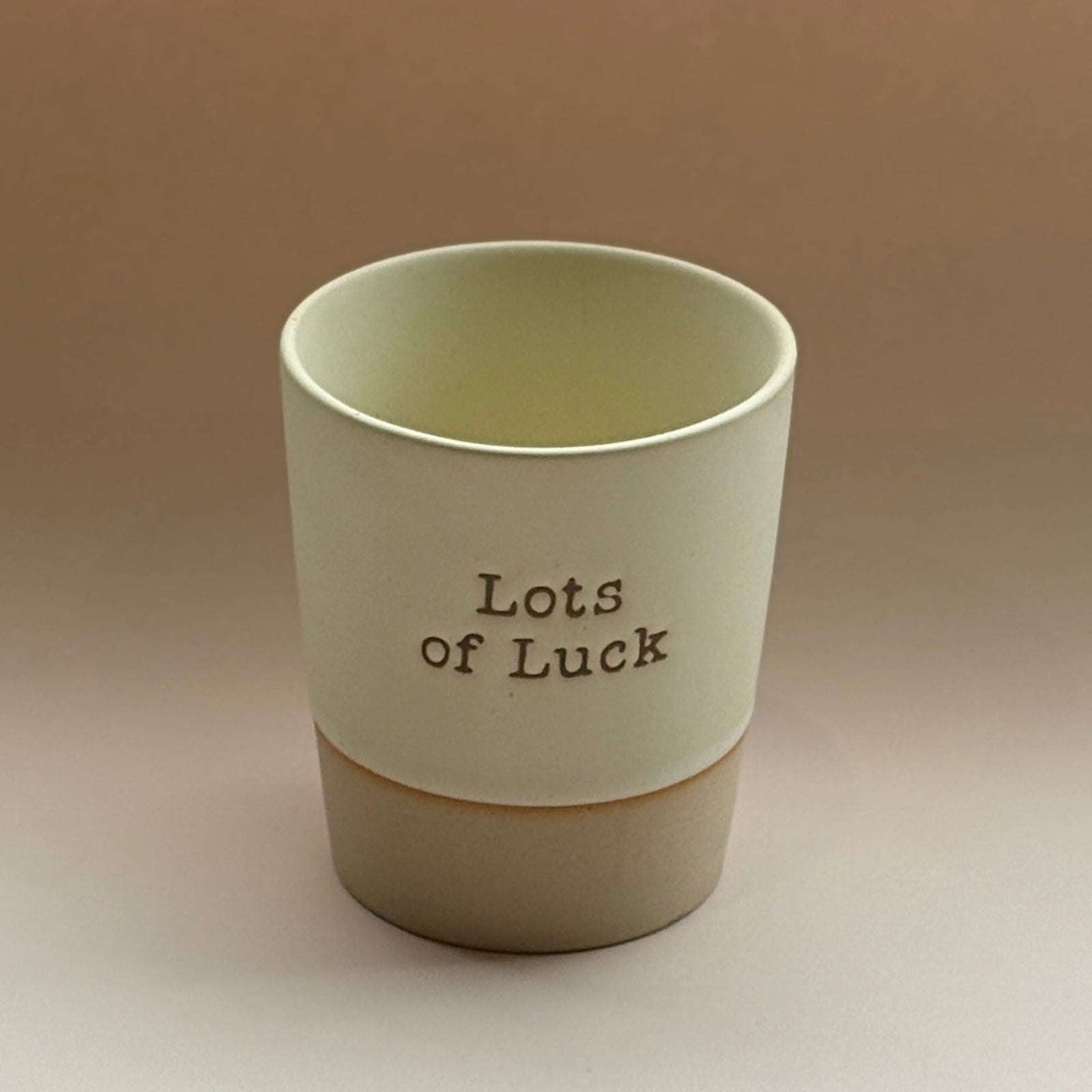 Mug with embossed lots of luck