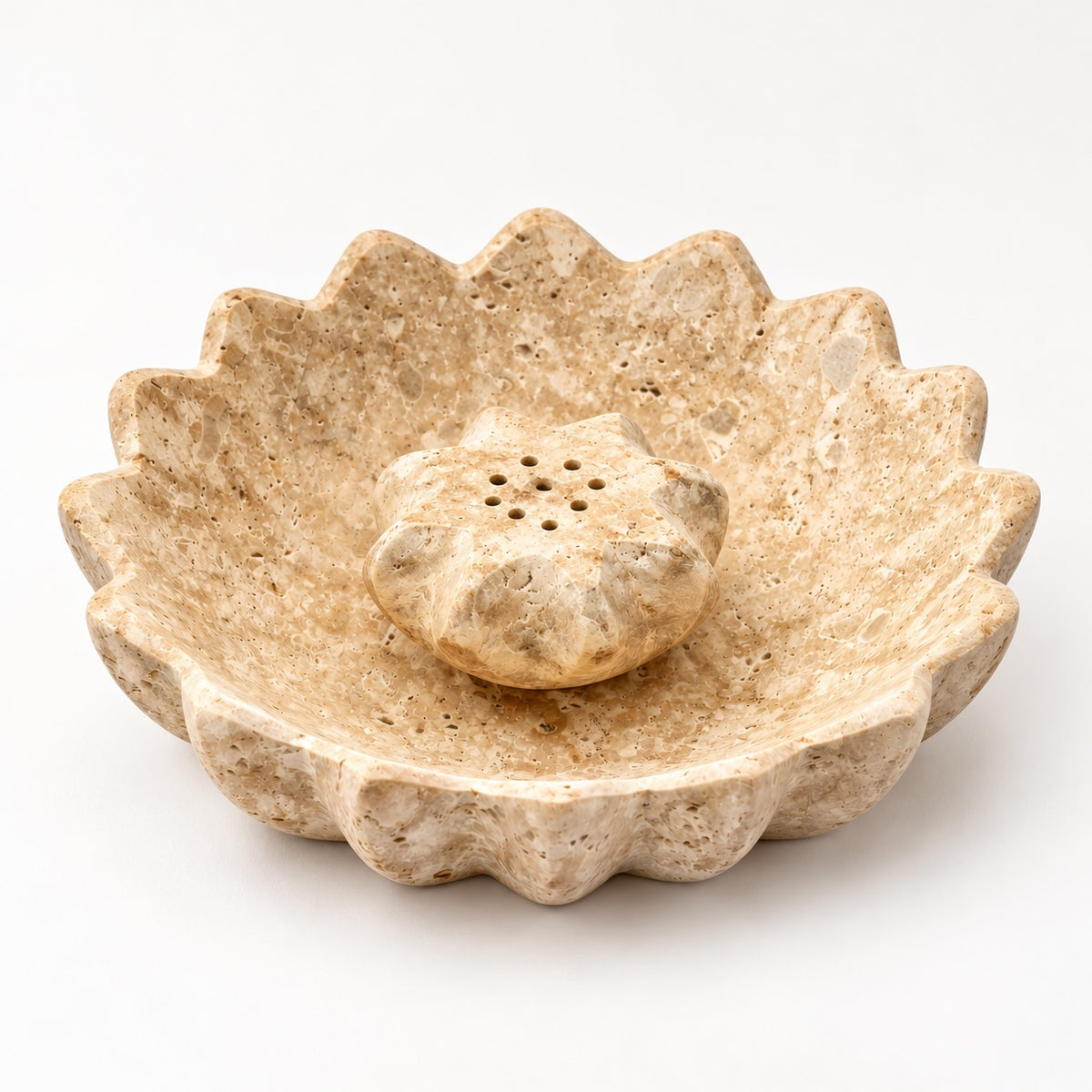 Lotus Stone Incense Holder made from natural travertine with a rounded incense stick holder and sculptural ash-catching tray.