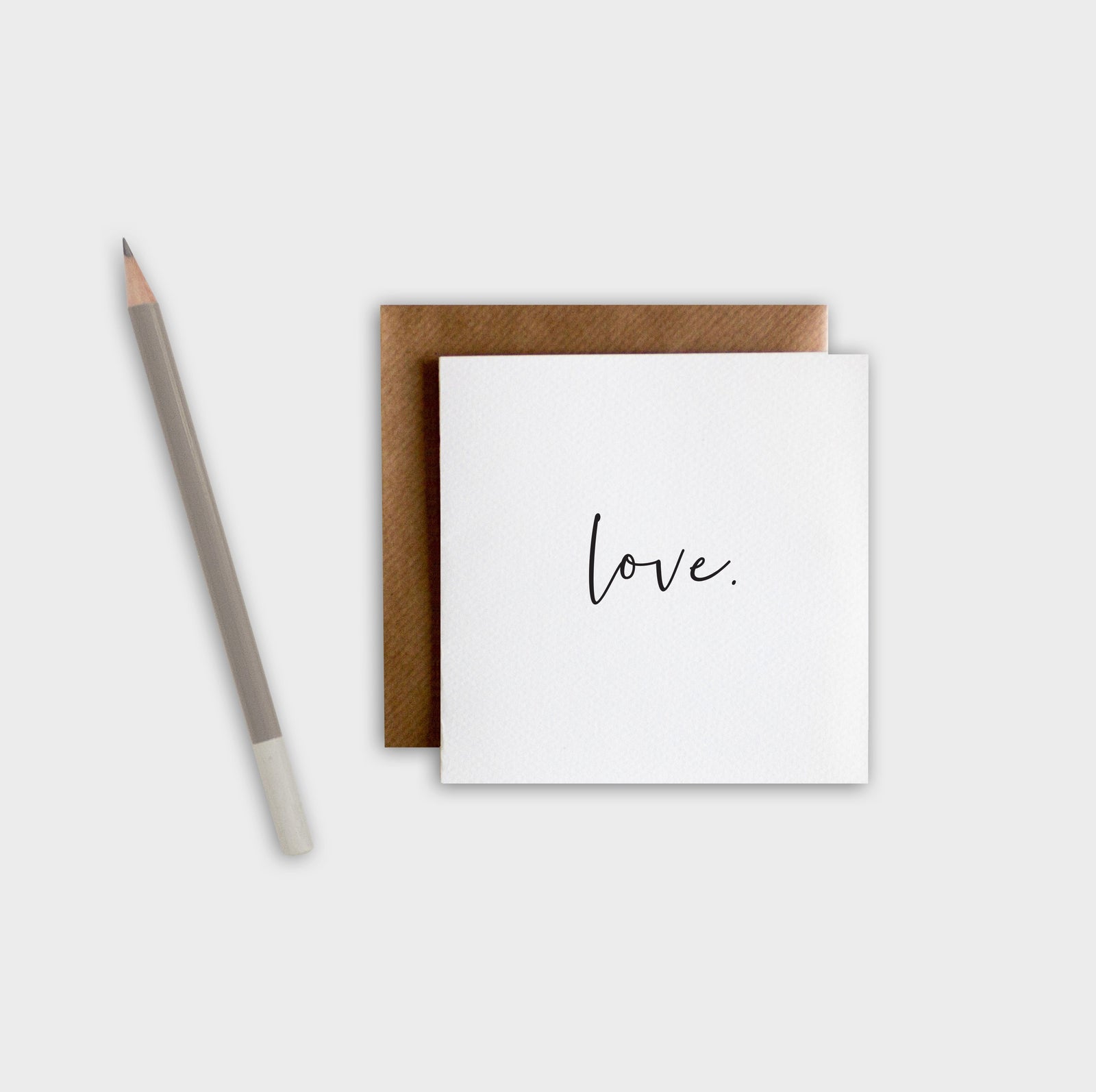 Minimalist Love greeting card on thick textured cotton pulp paper with blank inside.
