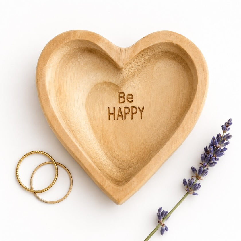 Heart shaped wooden trinket dish with “Be Happy” engraved message.