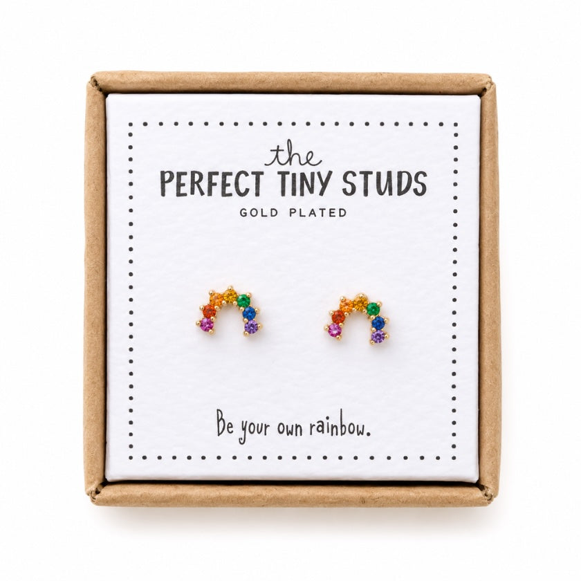 Gold plated rainbow stud earrings with colourful crystal details presented on an inspirational “Be your own rainbow” gift card in a kraft gift box.