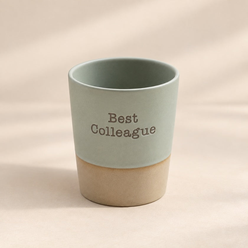 Best Colleague ceramic mug in sage green with natural-toned base.