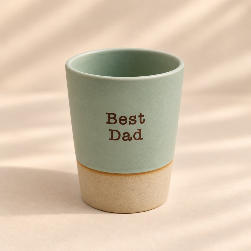 Best Dad hand-glazed ceramic mug in soft sage green with natural-toned base.