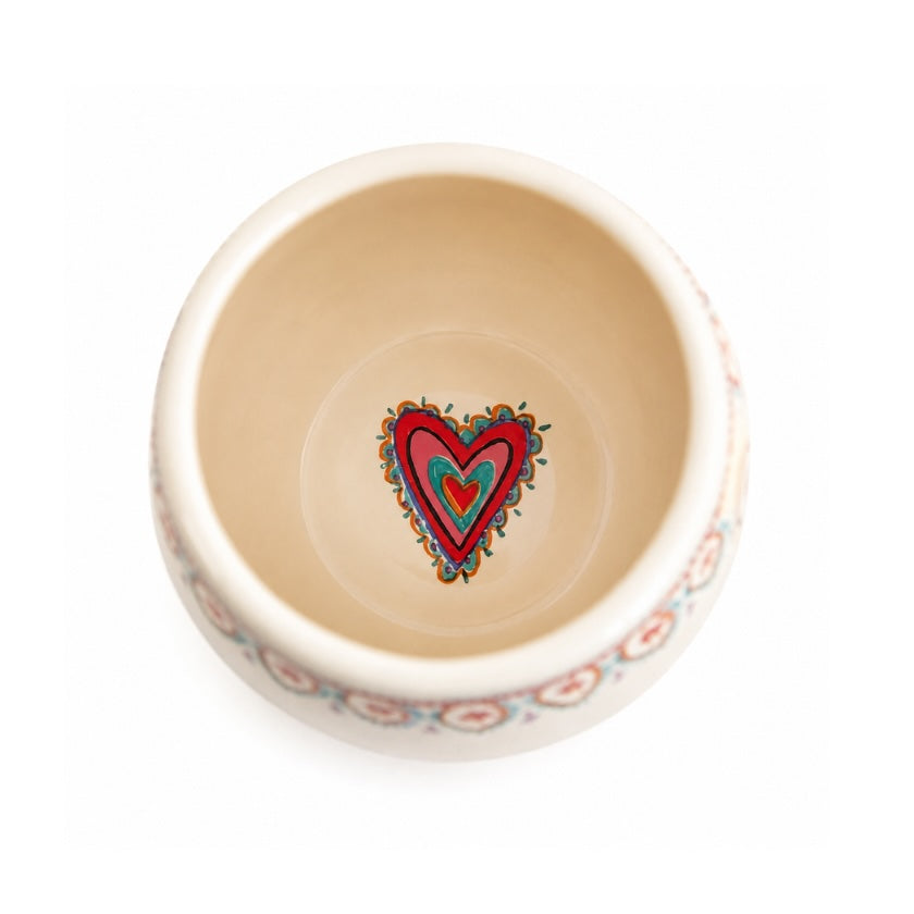 Hidden heart illustration inside the base of the Luna and Soul Cup of Love Ceramic Mug