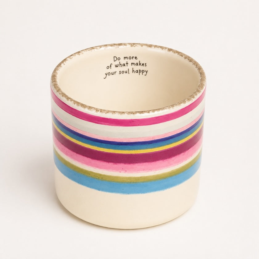 Ceramic planter with colourful hand painted stripe design and “Do more of what makes your soul happy” quote inside the rim.