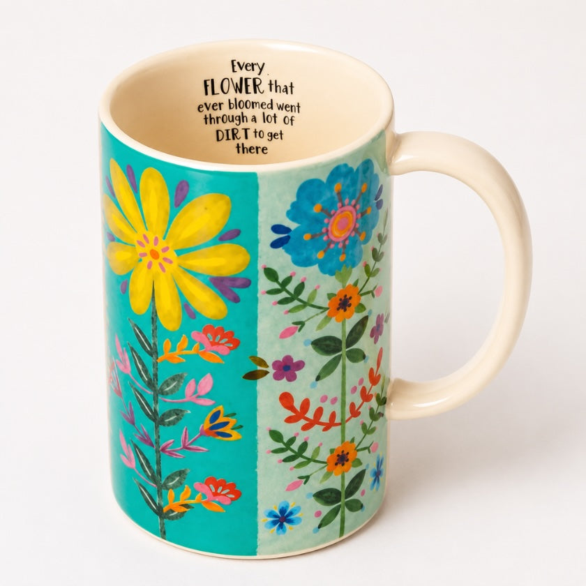 Colourful ceramic floral mug with hand painted style flowers and inspirational quote inside, featuring turquoise and pastel tones for a mindful tea or coffee ritual.