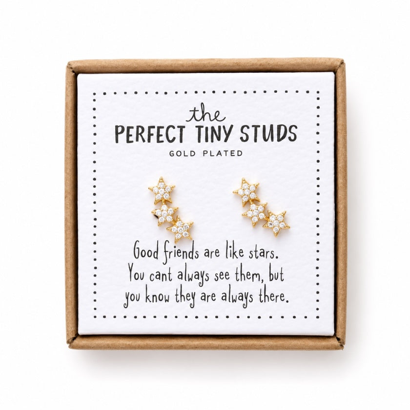 Gold plated star stud earrings with crystal details presented on a friendship gift card featuring “Good friends are like stars” quote in a kraft gift box.