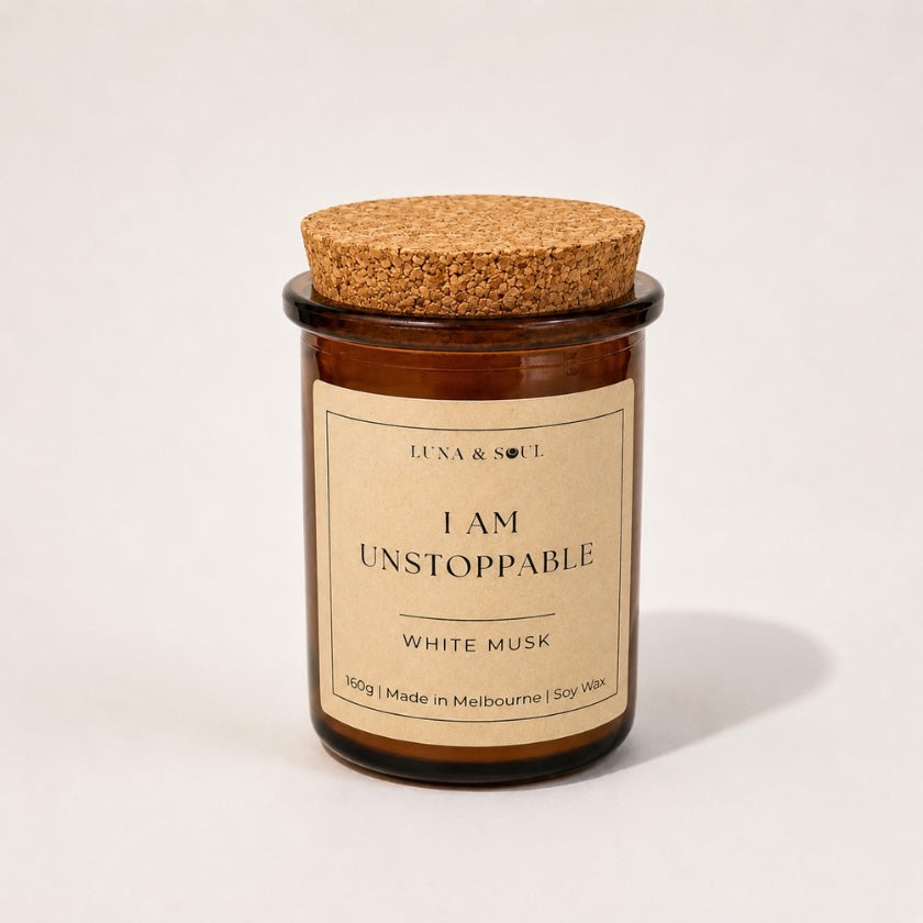 Luna and Soul I Am Unstoppable White Musk affirmation soy wax candle in amber glass jar handmade in Melbourne