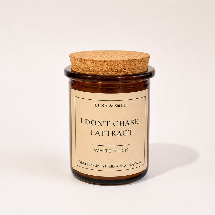 Luna and Soul I Don't Chase, I Attract White Musk affirmation soy wax candle in amber glass jar handmade in Melbourne