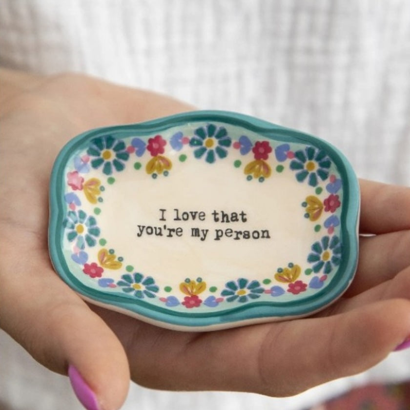 I Love That You're My Person ceramic trinket dish with colourful hand-painted flowers and teal border.
