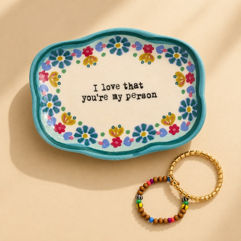I Love That You're My Person ceramic trinket dish with colourful hand-painted flowers and teal border.