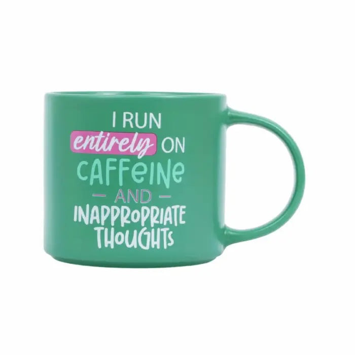Green ceramic mug with I run entirely on caffeine and inappropriate thoughts cheeky saying.
