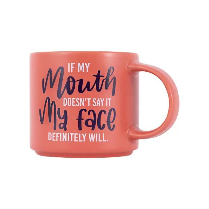 Coral red 390ml ceramic mug with If my mouth doesn’t say it my face definitely will cheeky quote.