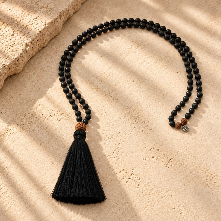 Lava and Rudraksha 108 bead mala necklace with silver plated AUM charm.