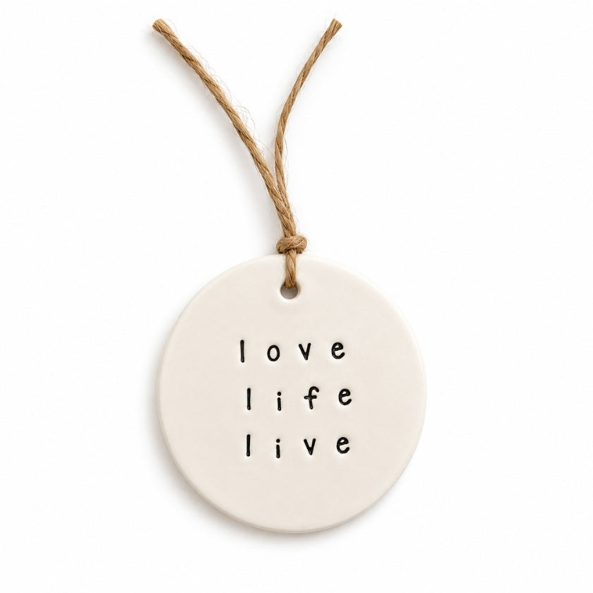 Luna and Soul Love Life Live handmade ceramic tag with jute twine on white background