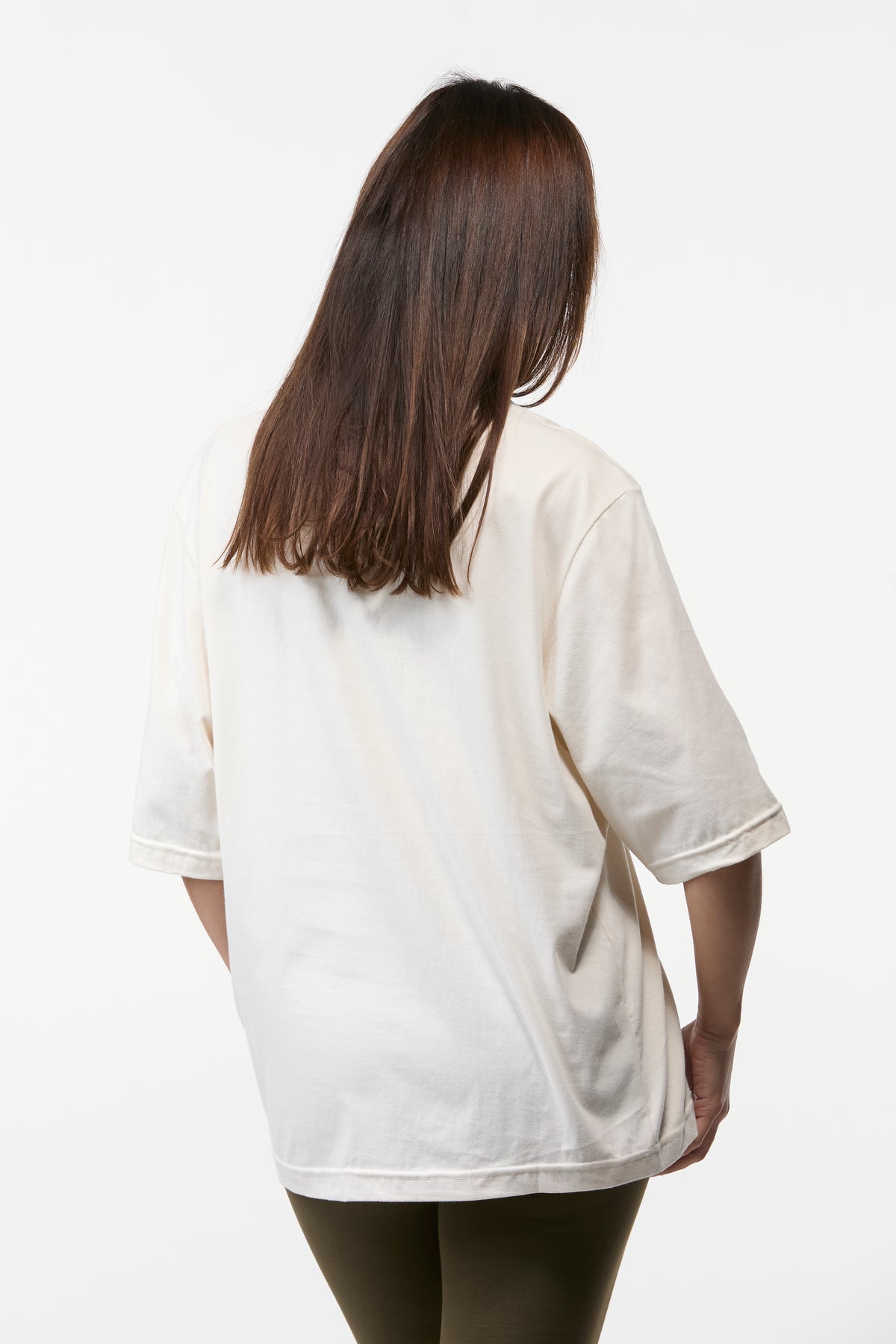 Back view of oat oversized tee for women with an easy relaxed silhouette and minimal style