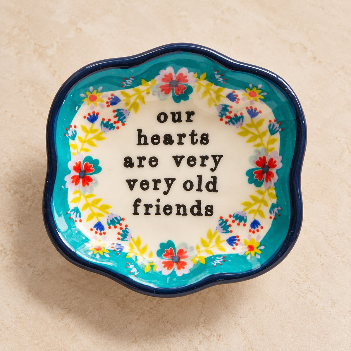 Colourful Old Friends little trinket dish with floral design.