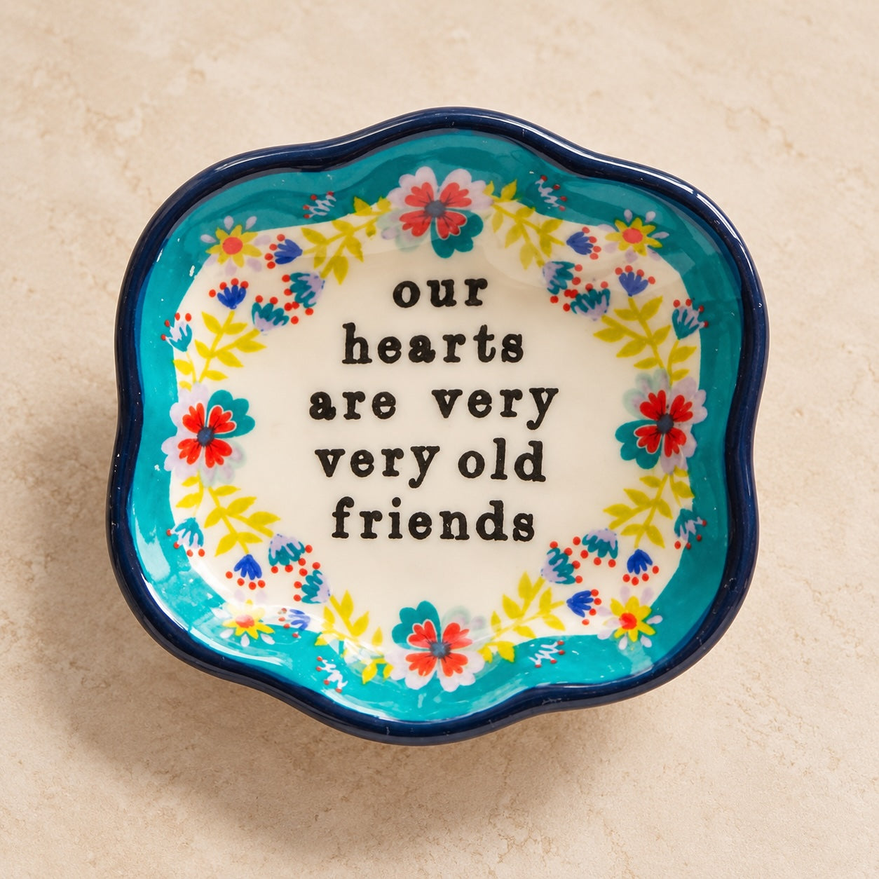 Colourful Old Friends little trinket dish with floral design.