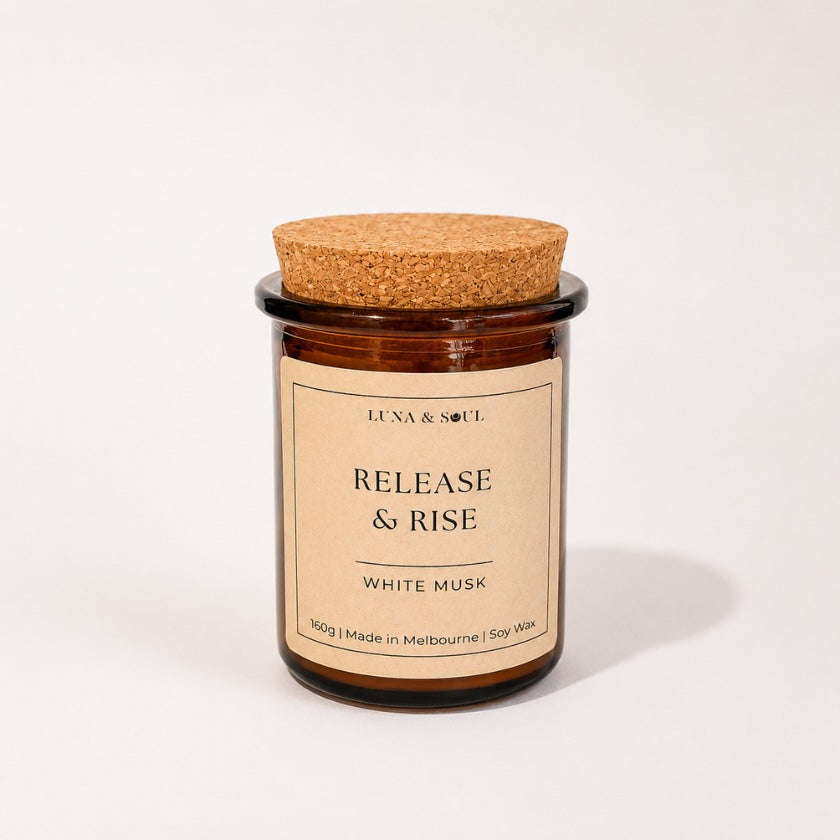 Luna and Soul Release &amp; Rise White Musk affirmation soy wax candle in amber glass jar handmade in Melbourne