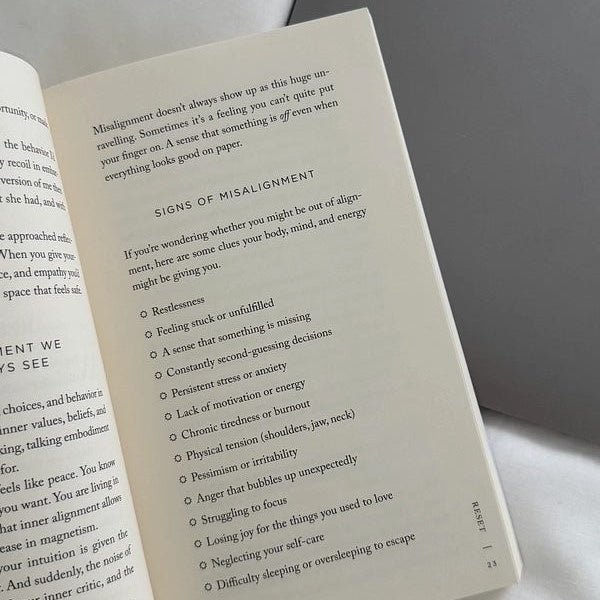 Detail of RESET manifestation and personal growth book.