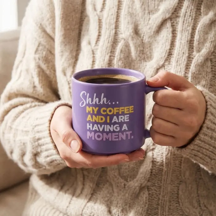 Purple Shhh my coffee and I are having a moment ceramic mug in two hands.