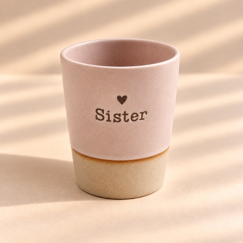 Soft blush hand-glazed ceramic Sister Mug with heart detail by Luna &amp; Soul.