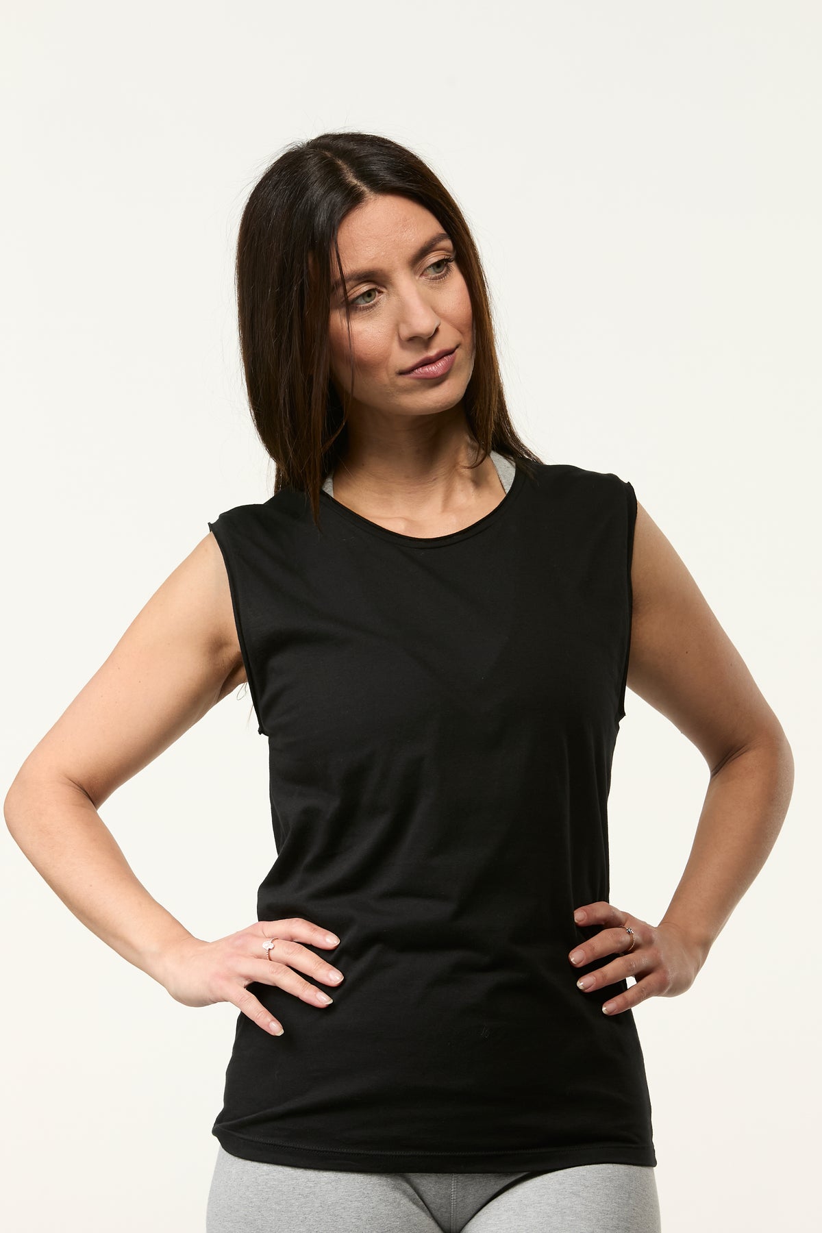 Front view of the Slim Fit Tank in black designed for movement, layering, and studio wear