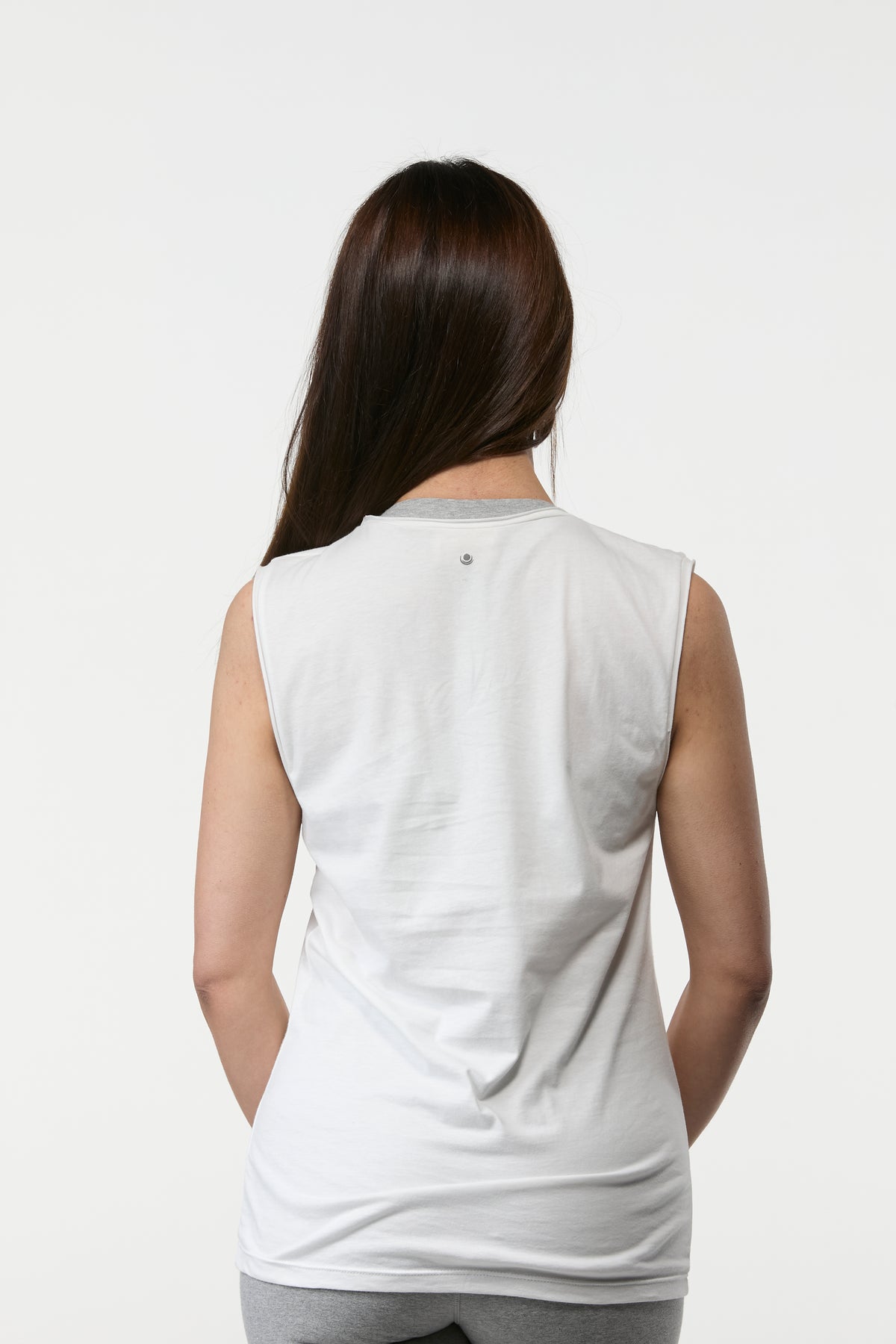 Back view of the Slim Fit Tank in white with a smooth fit and clean minimal design

