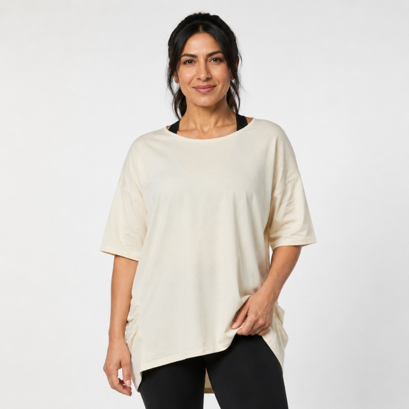 Front view of Luna &amp; Soul Zen organic cotton oversized yoga top in oat with hi-low hem